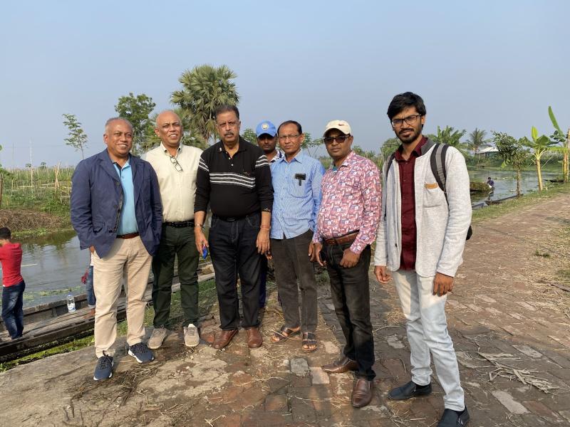 Rezaur Rahman and his brother meeting farmers in Khulna, Bangladesh